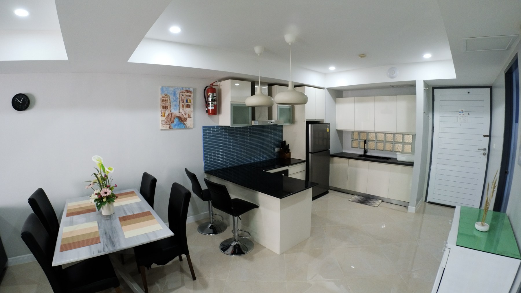 Living room with ceiling fan in a Patong condo